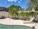 Lush backyard with vibrant greenery, providing a tranquil and private outdoor space at 7808 The Esplanade Ct, Orlando, FL 32836