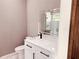 Bathroom featuring modern fixtures and a vanity sink at 7808 The Esplanade Ct, Orlando, FL 32836