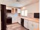 Modern kitchen features butcher block countertops, stainless steel appliances, and stylish white cabinets at 7808 The Esplanade Ct, Orlando, FL 32836