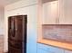 Modern kitchen featuring stainless steel appliances and beautiful cabinetry at 7808 The Esplanade Ct, Orlando, FL 32836