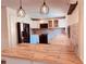 Well-appointed kitchen with butcher block counters, stainless steel appliances, and white cabinetry at 7808 The Esplanade Ct, Orlando, FL 32836