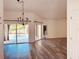 Bright living room with sliding glass doors that lead to a pool area, enhancing indoor-outdoor living at 7808 The Esplanade Ct, Orlando, FL 32836