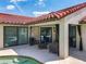 Outdoor patio features comfortable seating, offering an ideal space for relaxation and entertaining at 7808 The Esplanade Ct, Orlando, FL 32836