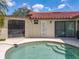 Backyard pool and spa with tile accents, perfect for outdoor relaxation and entertainment at 7808 The Esplanade Ct, Orlando, FL 32836