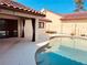 Backyard features refreshing in-ground pool and patio with black curtains, set against a blue sky at 7808 The Esplanade Ct, Orlando, FL 32836