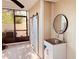 Enclosed porch featuring sink, cabinet, ceiling fan, and screened windows with a view to the outside at 7808 The Esplanade Ct, Orlando, FL 32836