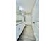 Modern bathroom with double vanity, granite countertop, and tiled shower at 11015 Bostwick Aly, Winter Garden, FL 34787