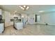 Spacious kitchen featuring a center island, stainless steel appliances, and tile flooring at 11015 Bostwick Aly, Winter Garden, FL 34787