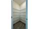 Pantry with adjustable metal shelving for organized storage at 11015 Bostwick Aly, Winter Garden, FL 34787