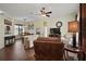 Open concept living and dining area with tile floors, neutral paint, and lots of natural light at 11041 Se 169Th Pl, Summerfield, FL 34491