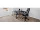 Dedicated carpeted office space with a large desk, ideal for remote work setup at 1179 Tyler Loop, Winter Haven, FL 33884