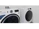 Laundry room featuring a modern washer and dryer at 1179 Tyler Loop, Winter Haven, FL 33884