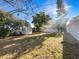 Spacious backyard features storage shed at 1311 Bryn Mawr Ave, Lake Wales, FL 33853