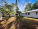Large, private backyard with a new metal roof and plenty of space for outdoor activities at 1311 Bryn Mawr Ave, Lake Wales, FL 33853
