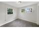 The bedroom has two windows providing natural light at 1311 Bryn Mawr Ave, Lake Wales, FL 33853