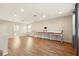 Bright bonus room with hardwood floors, recessed lights, and white trim at 13202 Spring Grove Way, Winter Garden, FL 34787