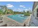 Relaxing community pool with comfortable lounge chairs and lush landscaping at 13202 Spring Grove Way, Winter Garden, FL 34787