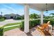 View from the front porch showcasing the well-manicured lawn and landscaping at 13202 Spring Grove Way, Winter Garden, FL 34787