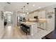 Well-equipped kitchen with a center island, stainless steel appliances, and plenty of cabinet space at 13202 Spring Grove Way, Winter Garden, FL 34787