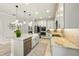 Elegant kitchen featuring granite countertops, stainless steel appliances, and custom cabinetry at 13202 Spring Grove Way, Winter Garden, FL 34787
