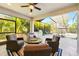 Screened lanai with plush seating, outdoor grill, and pool view at 13202 Spring Grove Way, Winter Garden, FL 34787