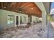 Inviting covered patio with ample seating and pool views, perfect for outdoor relaxation and gatherings at 13202 Spring Grove Way, Winter Garden, FL 34787