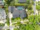 Aerial view of the property showing the pool, lush yard, and neighborhood setting at 1370 Alberta Dr, Winter Park, FL 32789