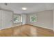 Spacious bedroom with hardwood floors and ample natural light at 1370 Alberta Dr, Winter Park, FL 32789