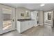 Well-equipped laundry room with modern washer and dryer, and ample counter space at 1370 Alberta Dr, Winter Park, FL 32789