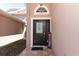 Welcoming front door featuring a decorative glass panel and a charming 'welcome' sign at 14021 King Sago Ct, Orlando, FL 32828