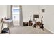 Spare bedroom featuring desk, music equipment and white trim on window and walls at 1511 Finnigan Cir, Haines City, FL 33844