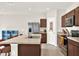 Features a spacious island, stainless steel appliances, and ample cabinet space at 1511 Finnigan Cir, Haines City, FL 33844