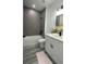 Stylish bathroom featuring a tub, walk in shower, and a sleek white vanity at 15282 Sw 65Th Avenue Rd, Ocala, FL 34473