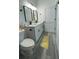 Bathroom with double vanity, modern fixtures, and light gray flooring at 15282 Sw 65Th Avenue Rd, Ocala, FL 34473