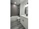 Stylish bathroom featuring a tub, walk in shower, and a sleek white vanity at 15282 Sw 65Th Avenue Rd, Ocala, FL 34473