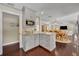 Well-lit corner featuring grey kitchen cabinets, quartz countertops, and modern appliances, enhancing the space's functionality at 1633 Pine Ave, Winter Park, FL 32789