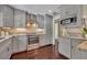 Modern kitchen with stainless steel appliances, granite countertops, and ample cabinet space for culinary enthusiasts at 1633 Pine Ave, Winter Park, FL 32789