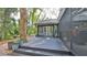 Exterior deck with a staircase, offering seamless transition to indoor living spaces at 1845 Spruce Creek Blvd, Port Orange, FL 32128