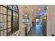 Bright kitchen featuring custom cabinets, stainless steel appliances and views to the lanai at 1845 Spruce Creek Blvd, Port Orange, FL 32128