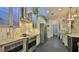 Bright kitchen with stainless steel appliances and custom cabinets, accented with unique decor at 1845 Spruce Creek Blvd, Port Orange, FL 32128