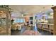 Bright and airy open-concept living room and kitchen area at 1845 Spruce Creek Blvd, Port Orange, FL 32128
