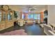 Living room with large windows, comfortable seating, and stylish decor at 1845 Spruce Creek Blvd, Port Orange, FL 32128