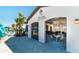 View of the community bar and lounge with an open patio and both indoor and outdoor seating at 1876 Nice Ct, Kissimmee, FL 34747