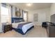 Comfortable bedroom with stylish decor, a plush bed, and plenty of natural light at 1876 Nice Ct, Kissimmee, FL 34747