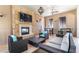 Lounge with fireplace, TV, and comfortable seating arrangement at 1876 Nice Ct, Kissimmee, FL 34747