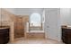 Beautiful bathroom featuring a tub, shower, natural light and tile details at 2218 Ridgewind Way, Windermere, FL 34786