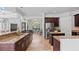 Spacious kitchen featuring a breakfast bar and stainless steel appliances at 2218 Ridgewind Way, Windermere, FL 34786