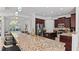 Gourmet kitchen with granite countertops, stainless steel appliances and breakfast bar at 2218 Ridgewind Way, Windermere, FL 34786