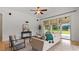 Bright living room with comfortable seating, natural light, and view of the backyard at 2218 Ridgewind Way, Windermere, FL 34786