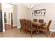 Cozy dining room with a wooden table set and elegant decor, perfect for Gathering gatherings at 30413 Plymouth Creek Cir, Sorrento, FL 32776